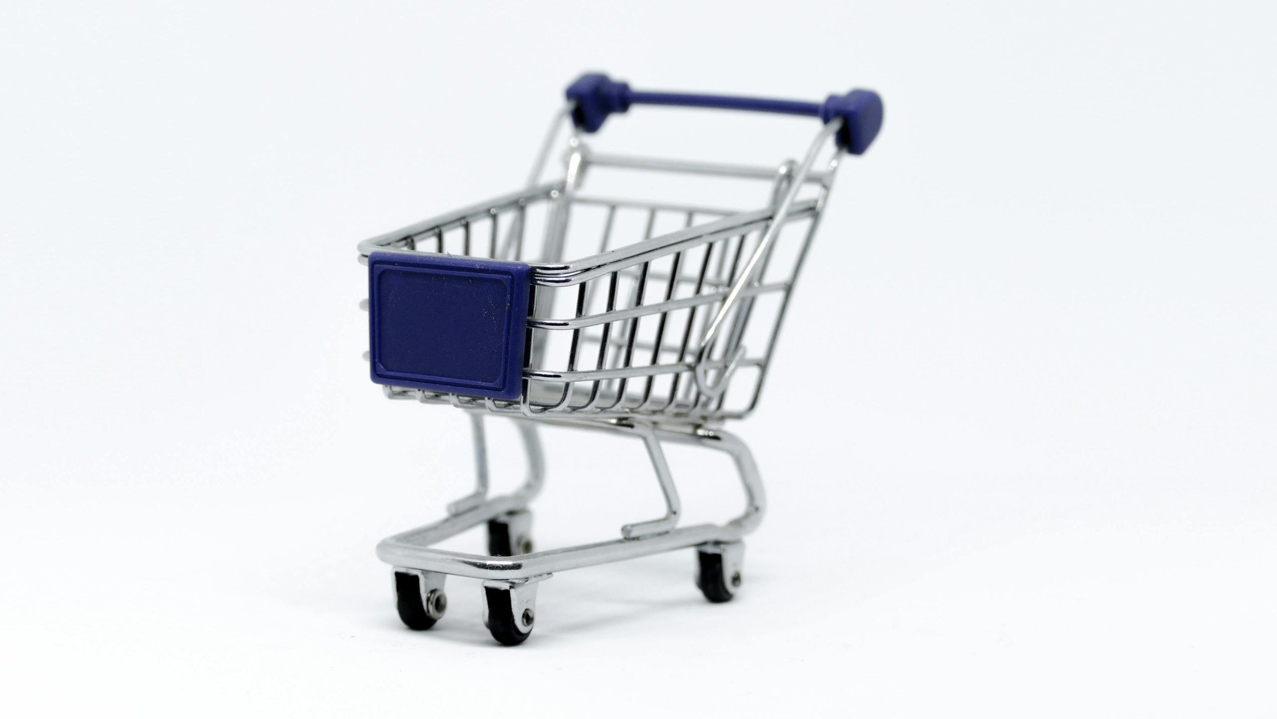 Cart full of colorful affordable products purchased at 99 cents only store